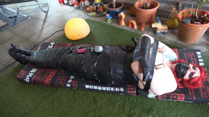 www.bondagecrossdresser.com - Tape Mummy on a hot summer Day thumbnail